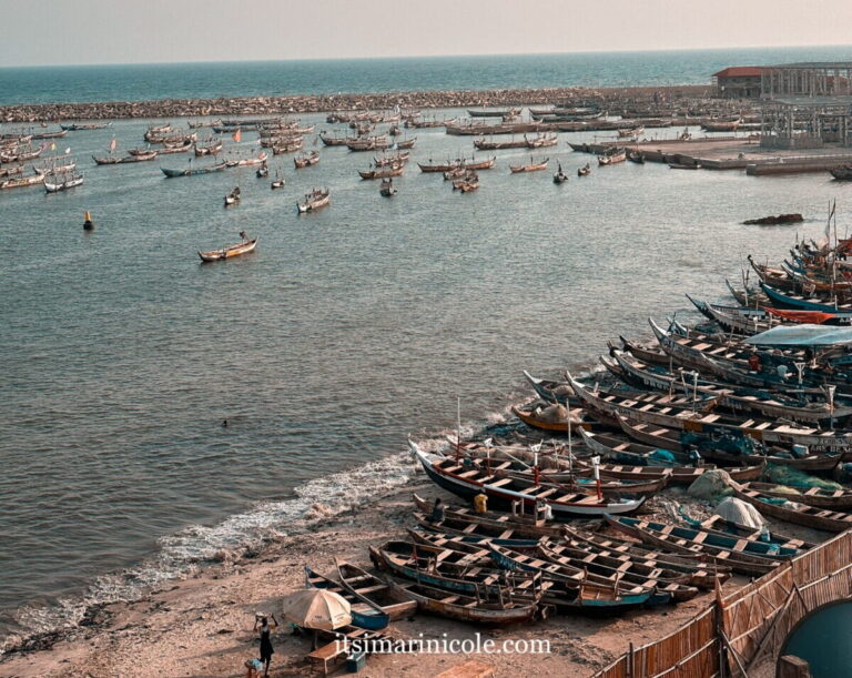 Colorful fishing boats along the Jamestown coastline, part of a 4-day Accra itinerary by the weekend traveler